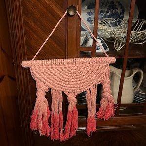 Macrame Ombré wall hanging. Beautiful coral colors. 12” wide by 13” long.